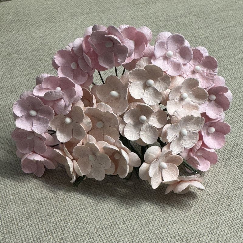 S&oslash;te blomster, lys varm rosa
